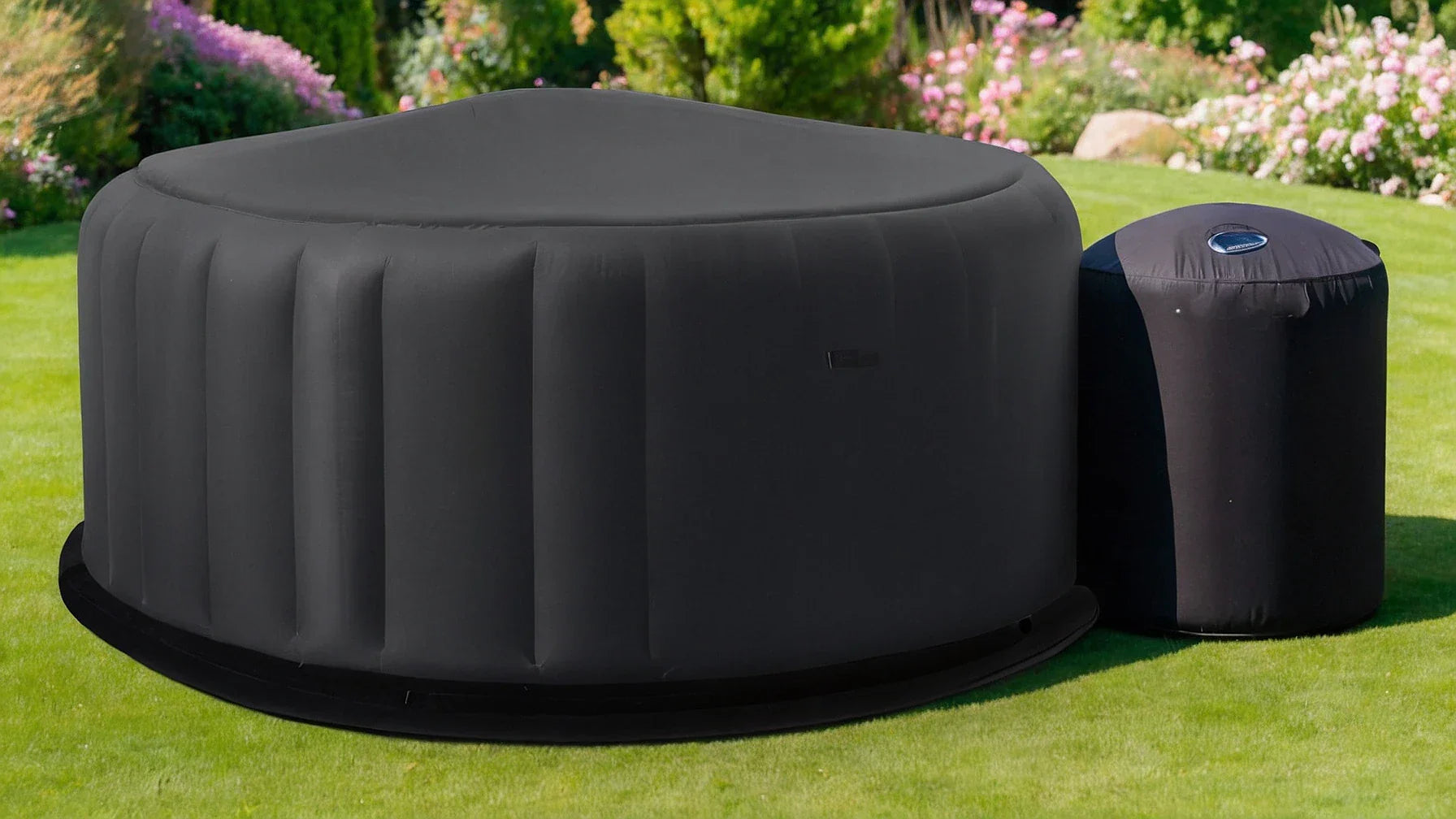 Inflatable black hot tub with separate pump and thermal cover from Our Thermal collection