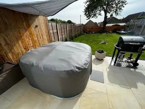 Covered hot tub.