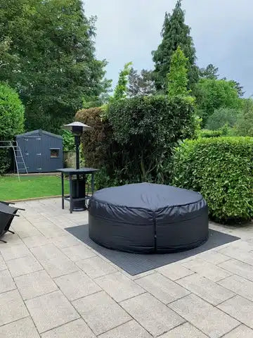 Covered round hot tub.