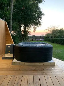 Inflatable black hot tub.