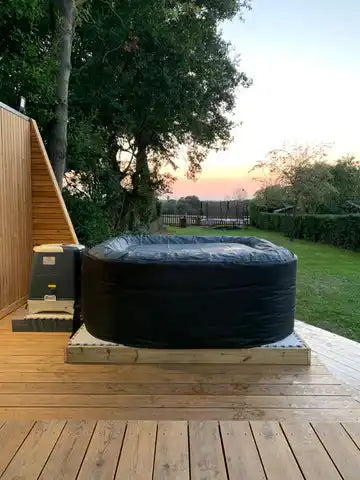 Inflatable black hot tub.