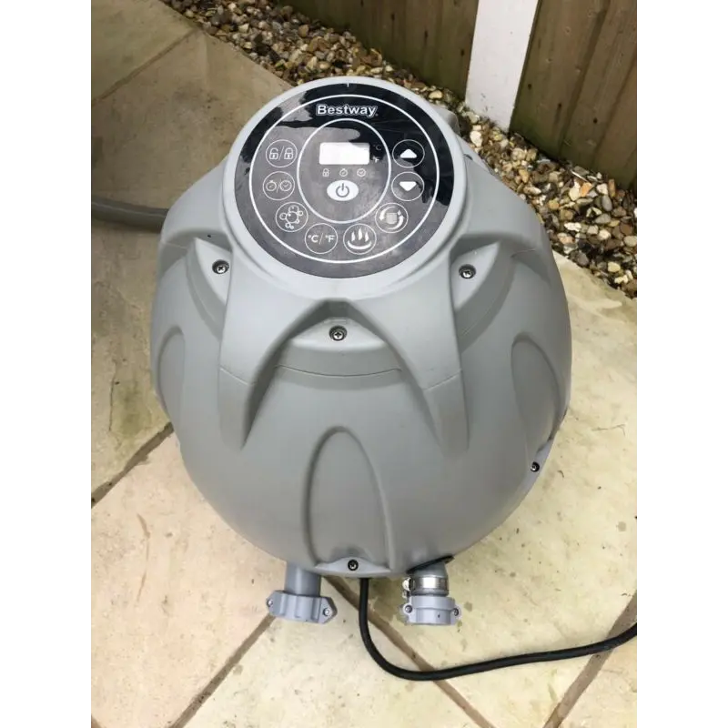Insulated Pump Cover For Egg Pump: Grey Pump On a Tiled Floor