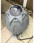 Insulated Pump Cover For Egg Pump: Grey Pump On a Tiled Floor