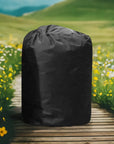 A Black Waterproof Pump Cover On a Wooden Walkway, Ideal For Lay-z Spa Airjet Hot Tub Protection