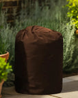 Insulated Pump Cover For Lay-z Spa Hydrojet 2021 Next To Plants And a Brown Bag