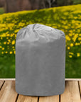 Insulated Pump Cover For Lay-z Spa Hydrojet Pro Shown In a Grey Trash Bag On Wooden Table